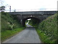 NU2309 : Railway bridge over the High Buston road by JThomas