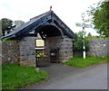 Lych gate and old Brecon County signpost, Penderyn