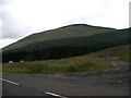 NN2630 : Forestry road meets the A85 in Glen Lochy by Elliott Simpson