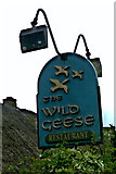 R4646 : Adare - Main Street - The Wild Geese Restaurant Cottage Sign by Joseph Mischyshyn