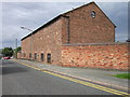 Former farm buildings at Manor Farm Court, Frodsham