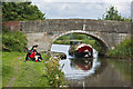 A canal boat negotiates Bridge 27 on the Leeds and Liverpool Canal