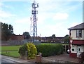 Telecommunications mast in suburbia