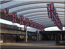 TQ2841 : Flags at Gatwick Airport by Colin Smith