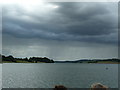 SK9207 : Rain over Rutland Water by Dave Spicer
