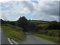 Open land at a junction of minor roads near Meldon Hill