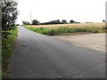 A concrete track off a country road