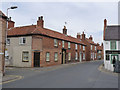 At the corner of High Street and Bell Lane 