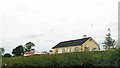 H8111 : Homesteads alongside the L8100 in Crossalare Townland by Eric Jones