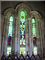 NY8773 : St. Mungo's Church, Simonburn - stained glass window (chancel) by Mike Quinn