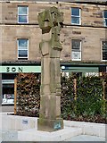 NT4936 : Man with a sheep statue in the Market Square, Galashiels by Walter Baxter