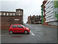 Car emerging from Trippet Lane onto Rockingham Street