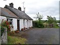 H6309 : Cottage and former stores at Shanmullagh by Eric Jones