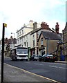 A small bus travels down Vale Street, Denbigh