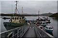 Boats moored to pontoon at Miabhaig