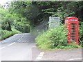 Phone box by the sign