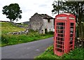 Telephone box and old barn in Little Hucklow