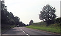 A458 passing woods by Whiston Priory