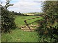 W7064 : Farm land and abandoned farm gate by Hywel Williams