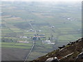 The Head Road/Brackenagh Road junction from the summit ridge of Binnian