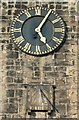 Clock and sundial on All Saints Church