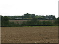 View due S to buildings alongside the A257