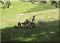 SH8205 : Sheep and agricultural implement, Cefn-Gader by Derek Harper