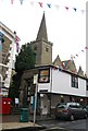 Church spire above Curry King