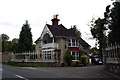 Merstham:  Lodge and gates to Rockshaw House