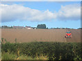 NT9753 : Sowing winter cereals near Letham Shank by Graham Robson