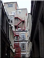 City buildings overlooking a small alley