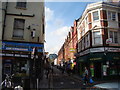 TQ3381 : View up Fashion Street from Brick Lane by Robert Lamb