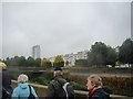 Flats shaped like the side of a ship from the path through Thames Barrier Park