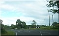 H4325 : Sharp bend on the B34 at Mullyduff by Eric Jones