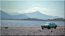 V6491 : Dingle Bay: Rossbehy Sands and mountains to SW, with 1978 BMW 320 by Ben Brooksbank