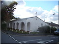 View of an arched house on the corner of Oak Lane and The Hollow