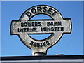 ST8814 : Iwerne Minster: detail of Bowers Barn finger-post roundel by Chris Downer