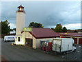 A lighthouse at sunset