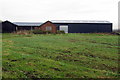 Farm buildings by the crossroads