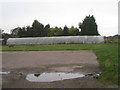 Car park and polytunnel off Wood Lane