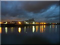 TQ7569 : Aggregates Terminal, Medway City Estate (at night) by David Anstiss