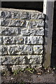 Benchmark on bus shelter, Rousham Road