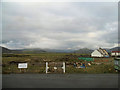 Waste ground and houses south of sewage works