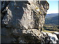 Rock carved graffiti in the base of the Lonely Shepherd