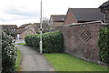 Wall and footpath outside #115 Redwood Avenue