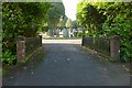 NS3879 : Vale of Leven Cemetery: the upper bridge by Lairich Rig