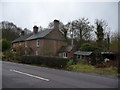 Cottage beside the B4194 road in Buttonoak