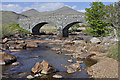 NM5429 : Old bridge over the Coladoir River by Iain A Robertson