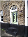 Small front door along the riverfront at Strand-on-the-Green