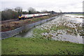 SP4909 : Cross Country train and flooded fields at Wolvercote by Roger Templeman